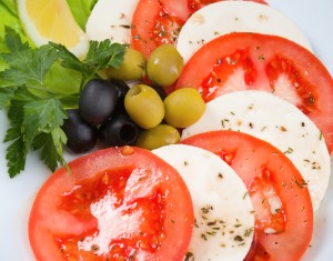 Mozzarella tomatoes olives Italian summer food