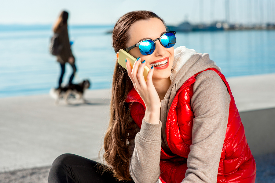 Woman strolling Italy promenade in spring fashion